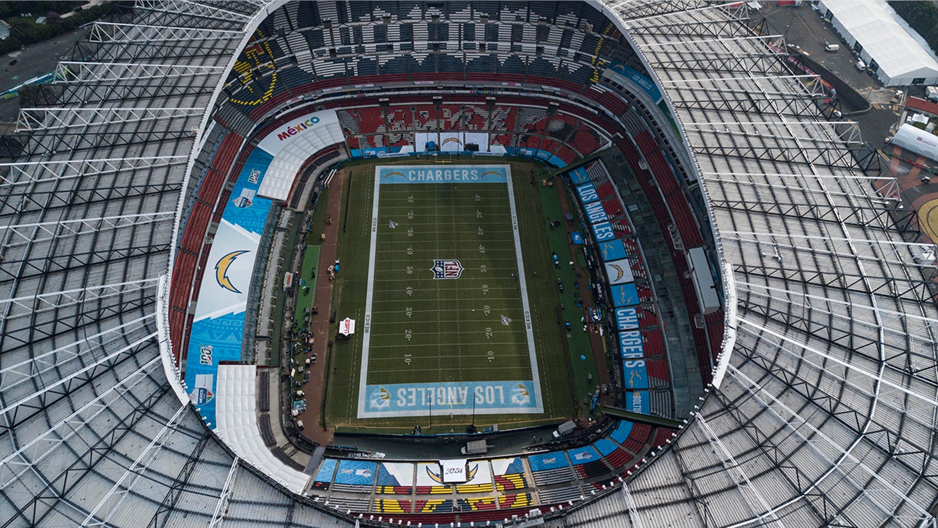 An aerial view of the Azteca Stadium in Mexico City, Saturday, Nov. 16, 2019, where the Kansas City Chiefs and Los Angeles Rams will face off for a regular-season Monday Night Football game. Heavy rain and heavy use last year left the grass unfit for the AFC matchup, forcing the Chiefs-Rams game to be relocated to Los Angeles. (AP Photo/Christian Palma)