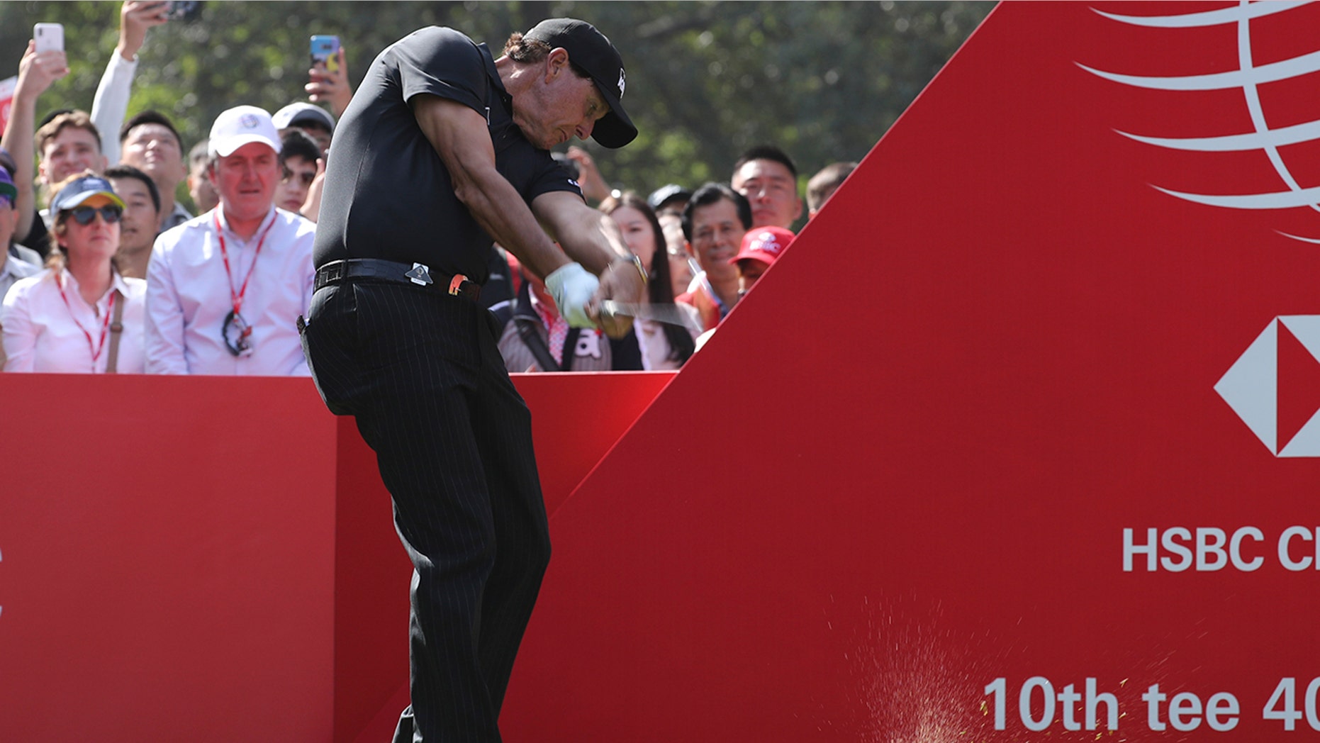 Phil Mickelson of the United States tees off for the HSBC Champions golf tournament at the Sheshan International Golf Club in Shanghai on Thursday, Oct. 31, 2019. (AP Photo/Ng Han Guan)