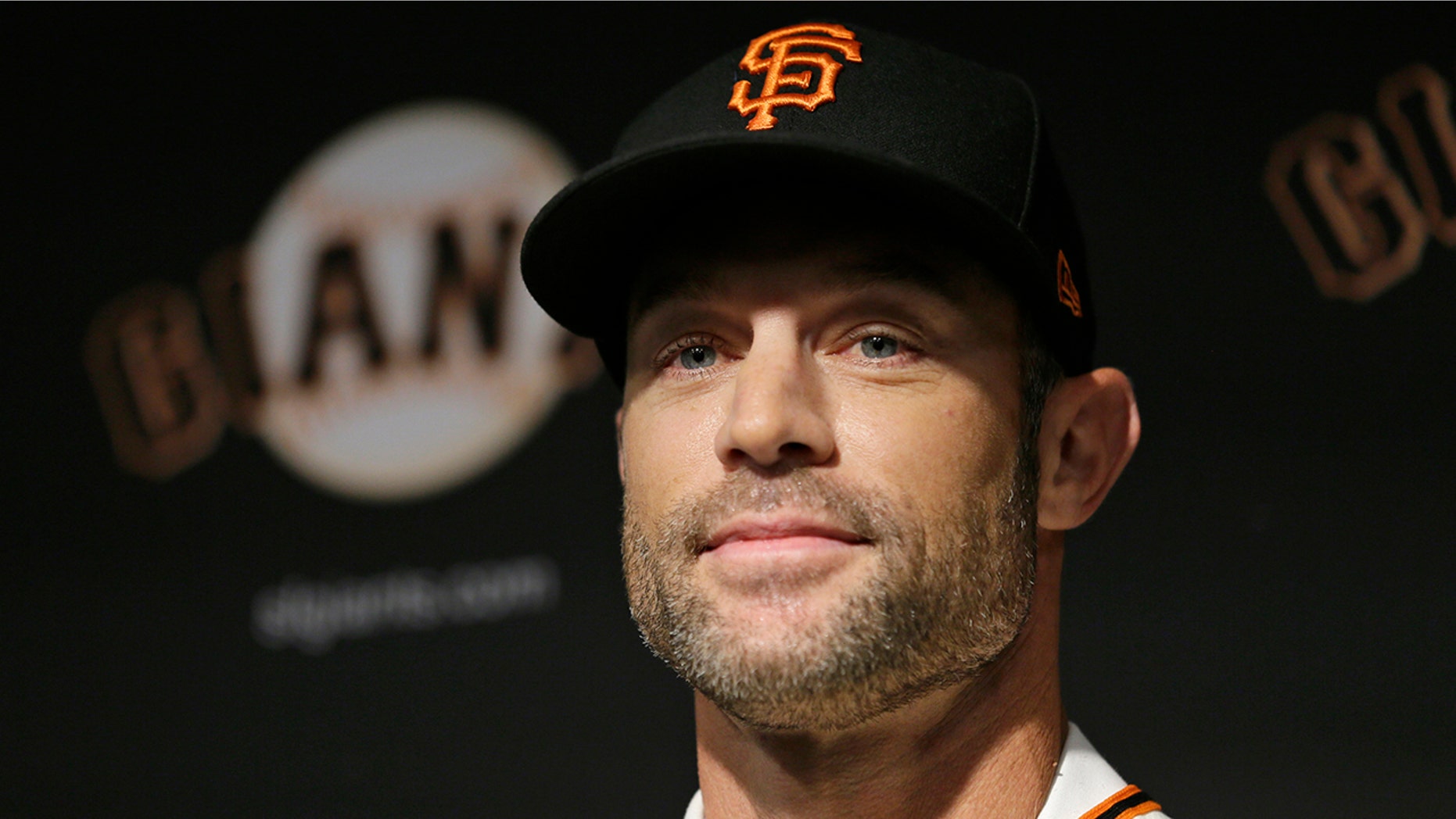 San Francisco Giants manager Gabe Kapler smiles after being introduced during a news conference at Oracle Park Wednesday, Nov. 13, 2019, in San Francisco. Gabe Kapler has been hired as manager of the San Francisco Giants, a month after being fired from the same job by the Philadelphia Phillies. Kapler replaces Bruce Bochy, who retired at the end of the season following 13 years and three championships with San Francisco. (AP Photo/Eric Risberg)