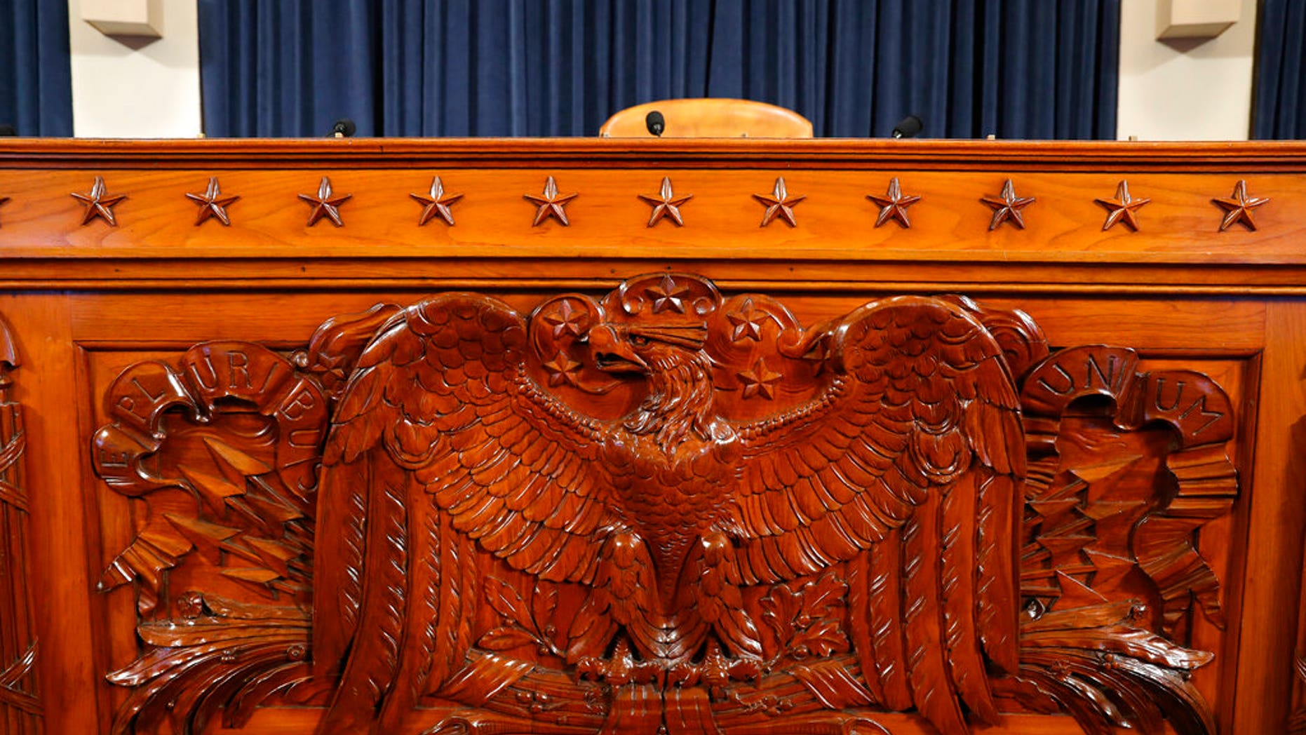 The dais inside the hearing room where the House will begin public impeachment hearings Wednesday, is seen Tuesday, Nov. 12, 2019, on Capitol Hill in Washington. (AP Photo/Jacquelyn Martin)