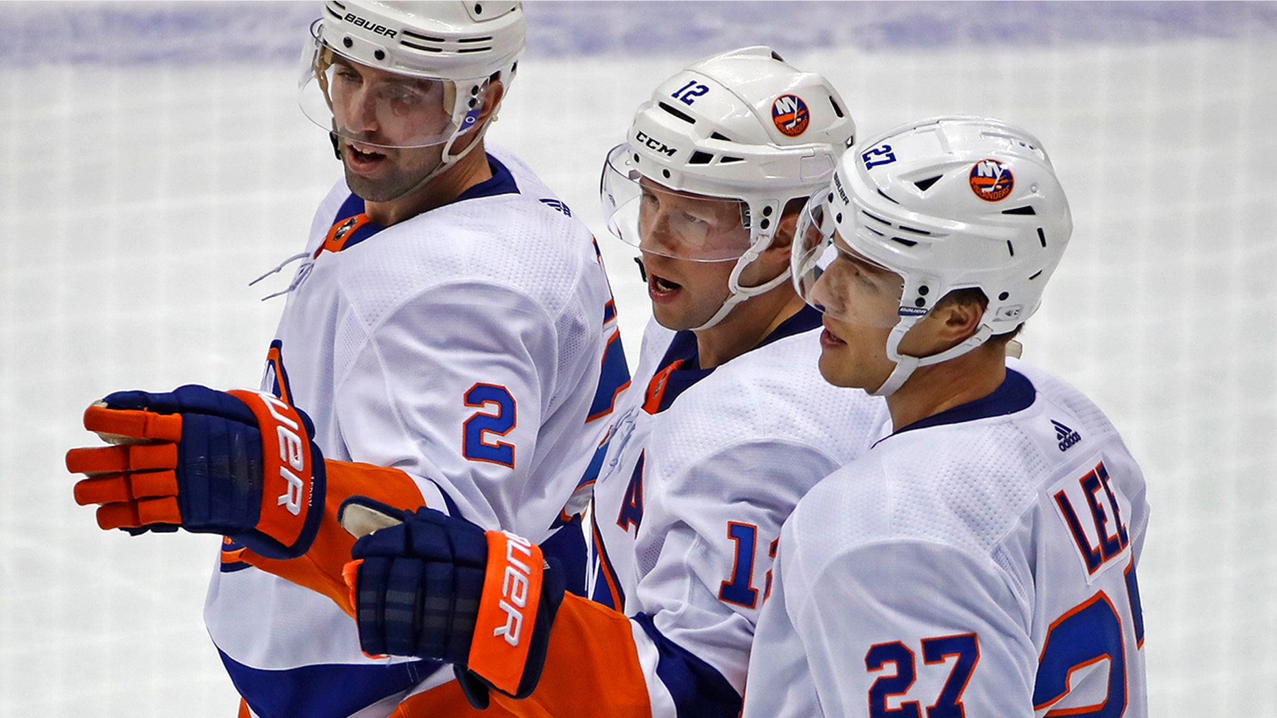 New York Islanders' Josh Bailey (12) celebrates after scoring during the third period of an NHL hockey game against the Pittsburgh Penguins in Pittsburgh, Tuesday, Nov. 19, 2019. The Islanders won 5-4 in overtime. (AP Photo/Gene J. Puskar)