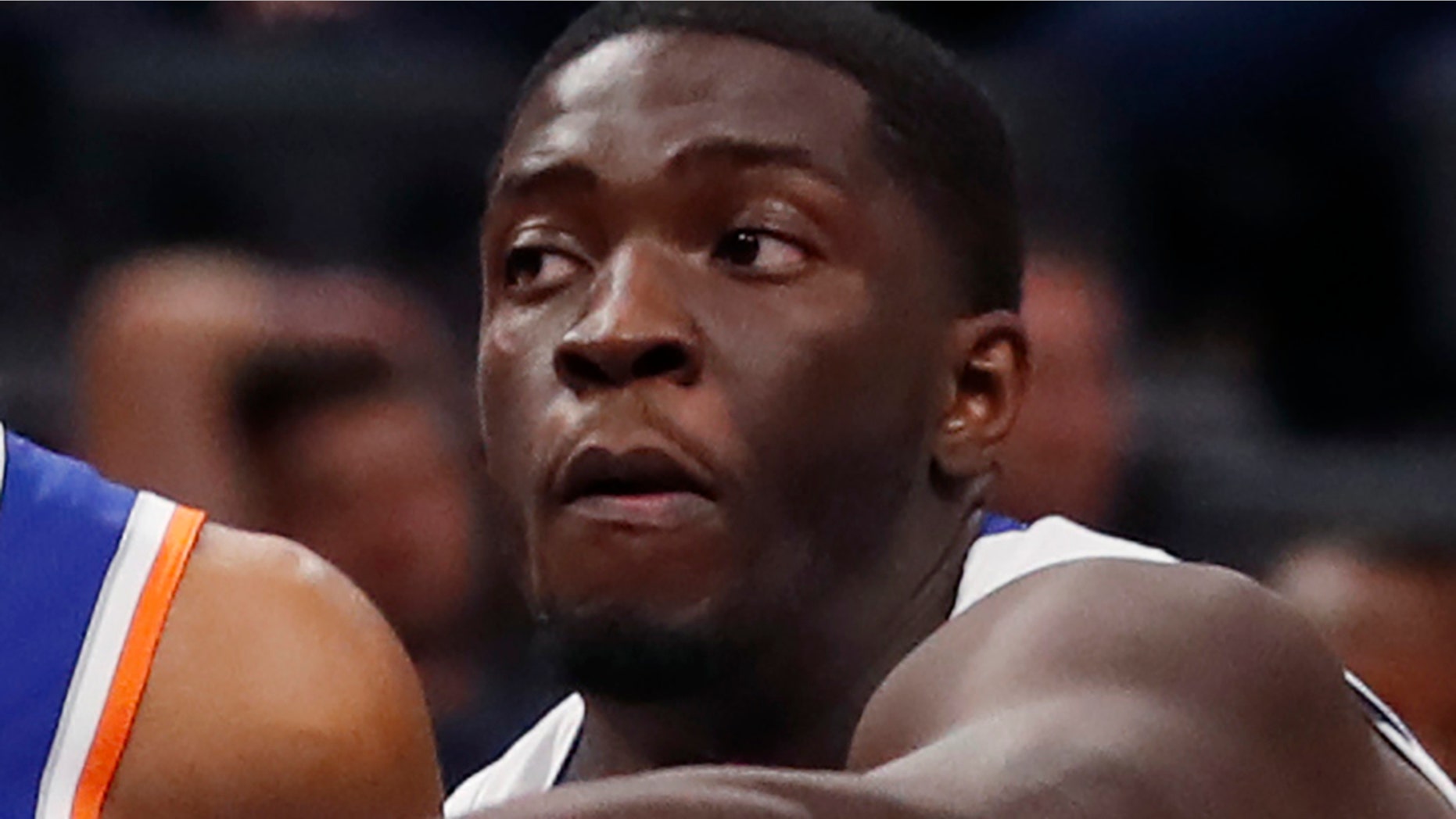 New York Knicks guard Allonzo Trier (14) looks to pass as Detroit Pistons guard Khyri Thomas (13) defends during the second half of an NBA basketball game, Wednesday, Nov. 6, 2019, in Detroit. (AP Photo/Carlos Osorio)