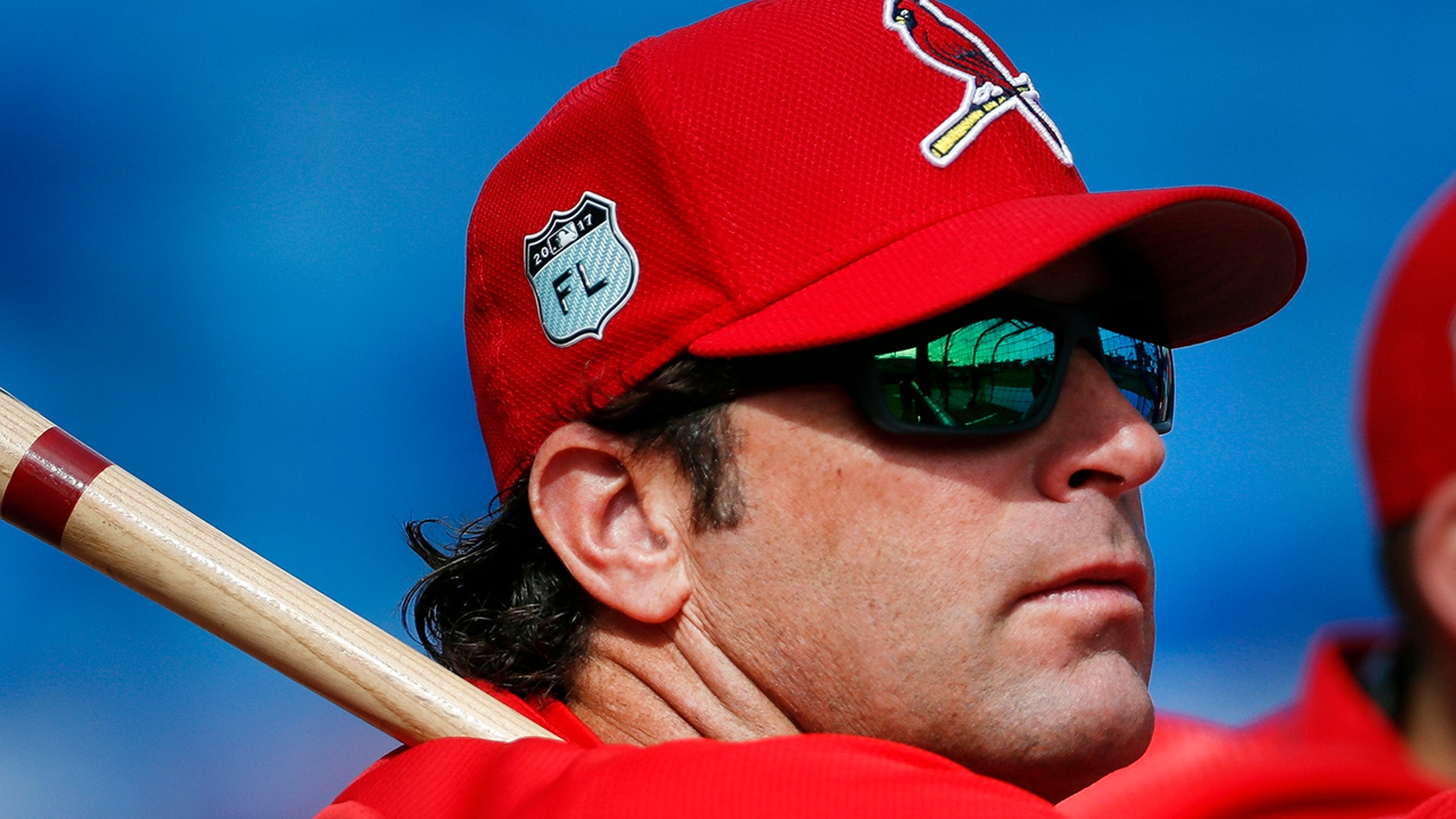 FILE - In this March 17, 2017, file photo, St. Louis Cardinals manager Mike Matheny (22) watches batting practice before a spring training baseball game against the New York Mets in Port St. Lucie, Fla. The Kansas City Royals have hired Matheny as manager on Thursday, Oct. 31, 2019. The 49-year-old Matheny was manager of the cross-state Cardinals from 2012-18, going 591-474 and becoming the first manager to reach the postseason his first four seasons. (AP Photo/John Bazemore, File)