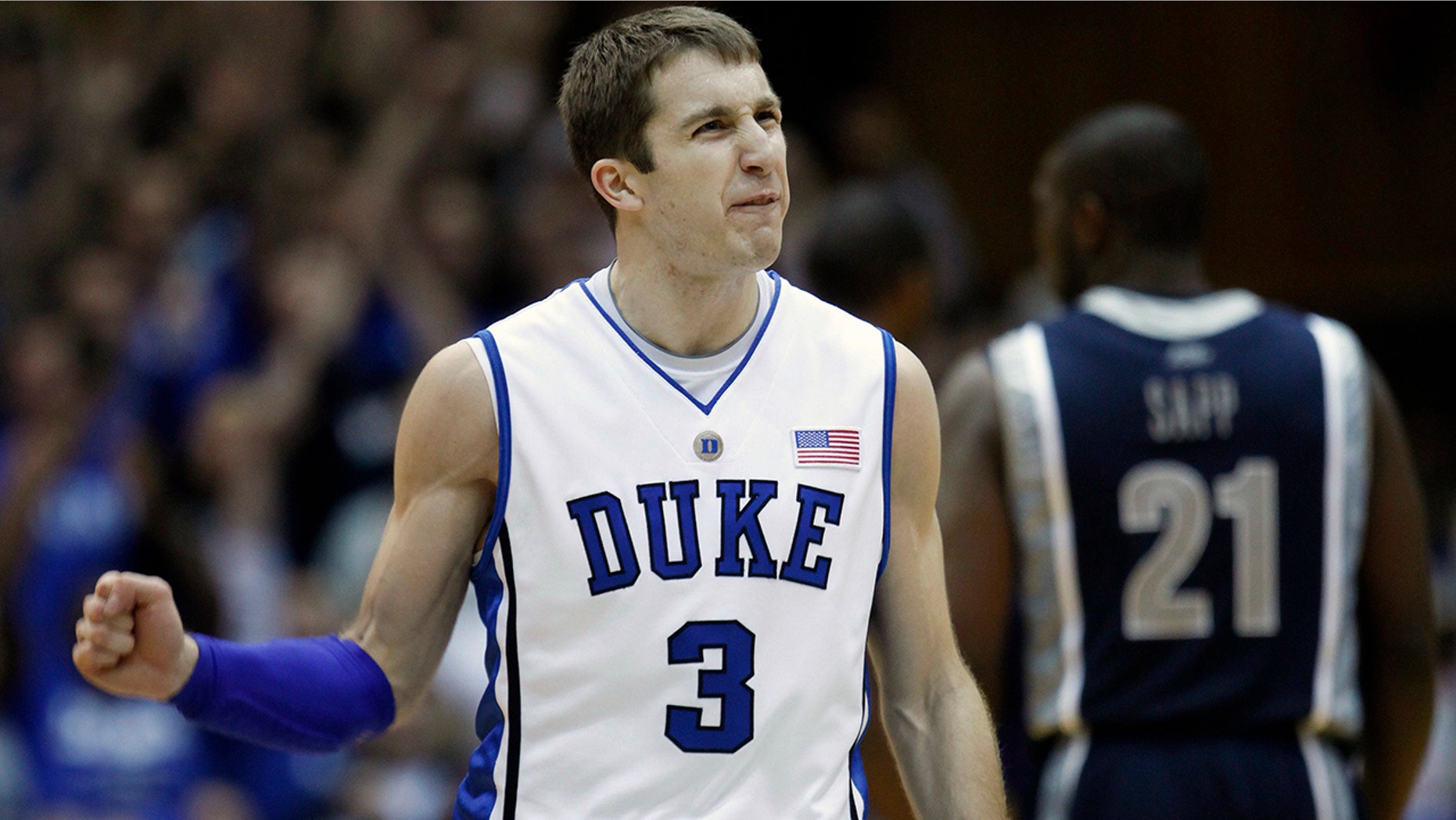 FILE - This is a Jan. 17, 2009, file photo showing Duke's Greg Paulus (3) reacting after a basket against Georgetown during the second half of an NCAA college basketball game in Durham, N.C. Niagara has removed the interim tag and named Greg Paulus the head coach of the men's basketball team. The promotion was announced Thursday, Nov. 7, 2019, two weeks after Paulus was elevated from assistant to interim coach after Patrick Beilein suddenly resigned for personal reasons. (AP Photo/Gerry Broome, FIle)