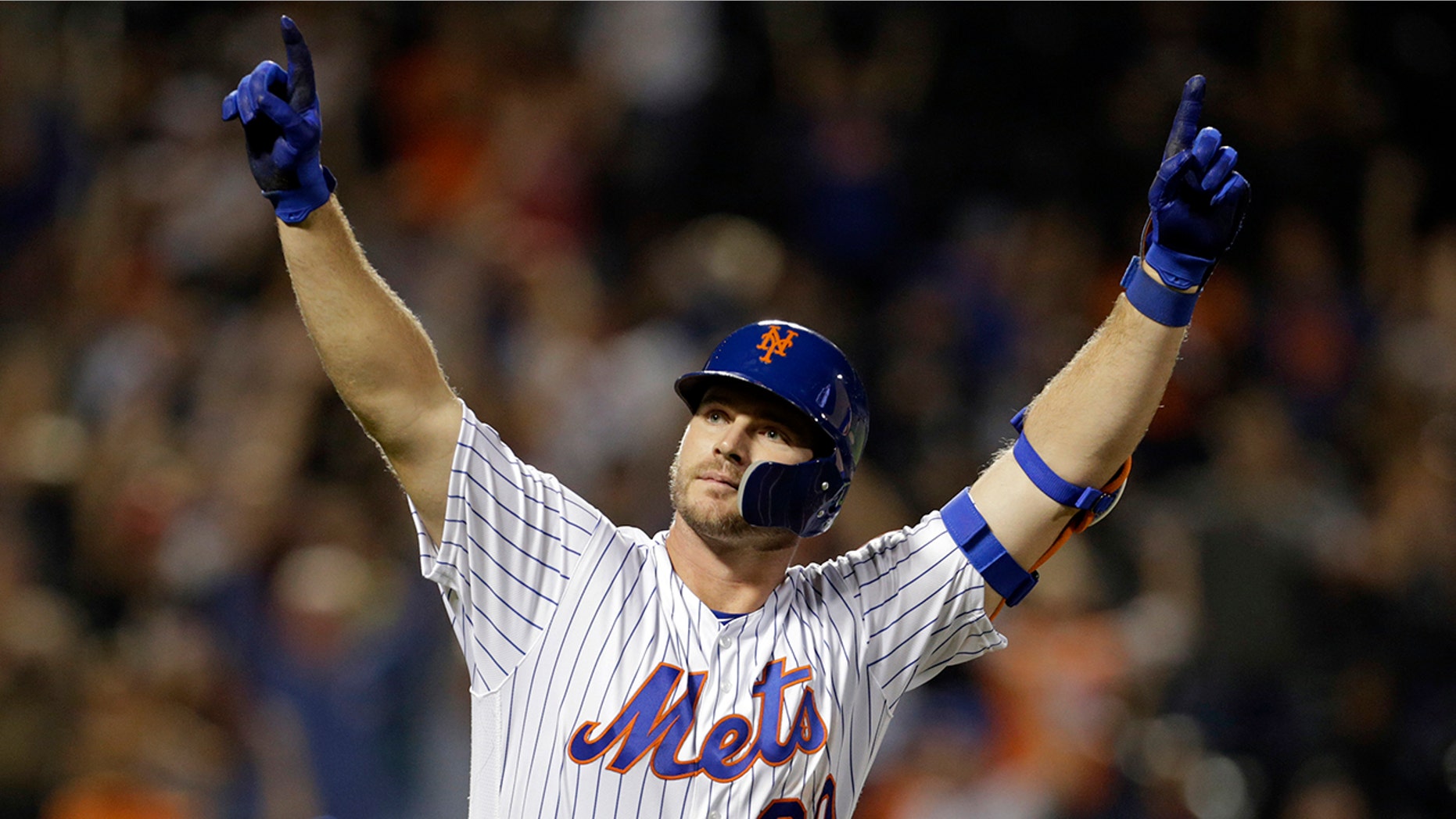 FILE - In this Sept. 28, 2019, file photo, New York Mets' Pete Alonso reacts after hitting a home run during the third inning of a baseball game against the Atlanta Braves, in New York. Mets first baseman Pete Alonso and Houston Astros slugger Yordan Álvarez have been picked as this year’s top rookies by Baseball Digest. (AP Photo/Adam Hunger, File)