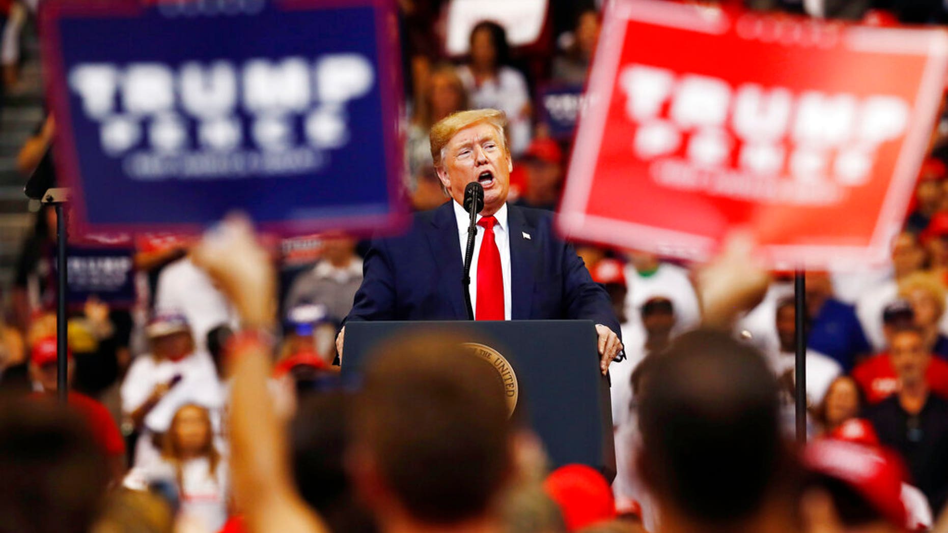 President Donald Trump speaks during a rally on Tuesday, Nov. 26, 2019, in Sunrise, Fla. (AP Photo/Brynn Anderson)