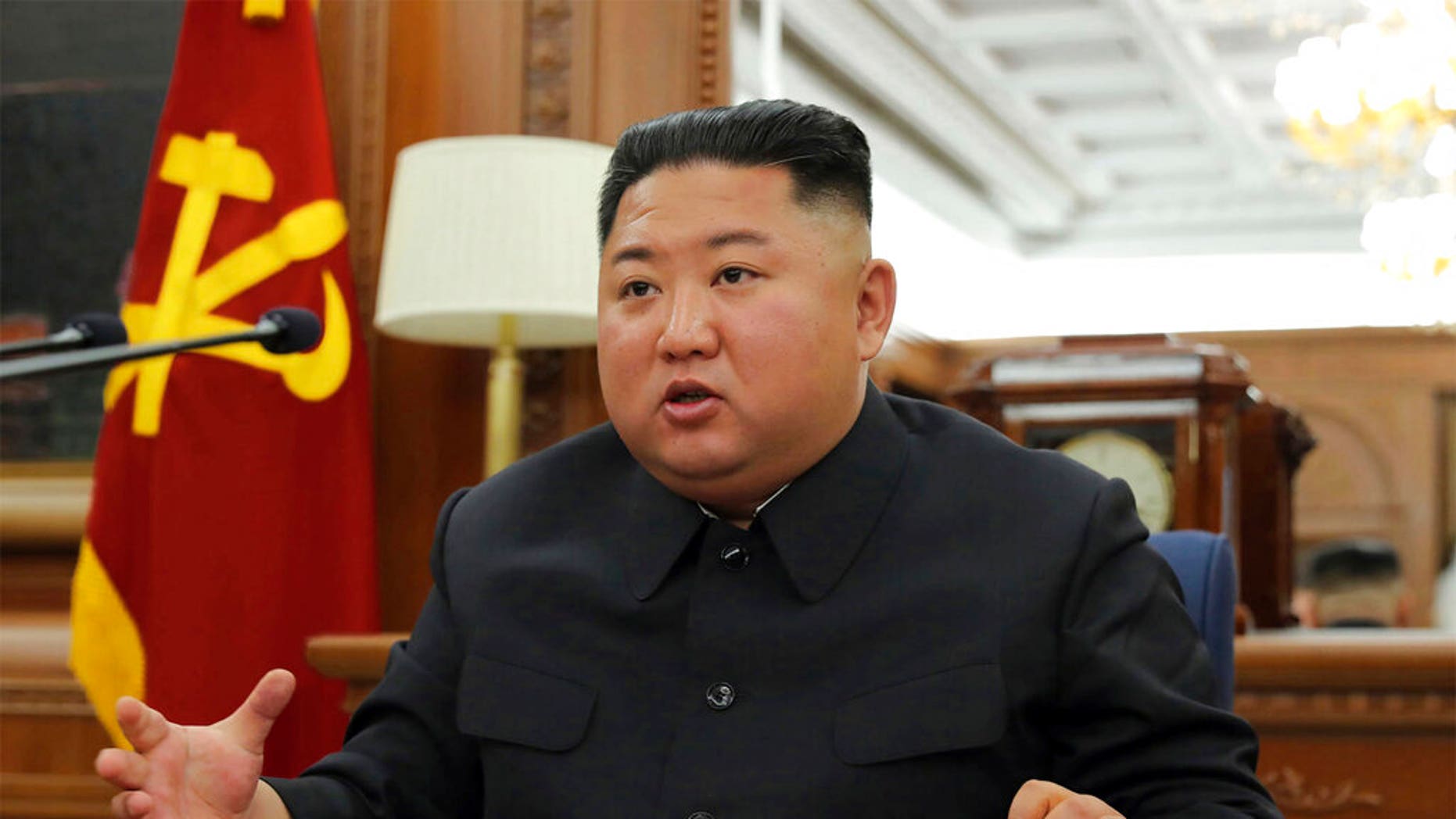 In this photo provided Sunday, Dec. 22, 2019, by the North Korean government, North Korean leader Kim Jong Un speaks during a ruling party meeting, North Korea. (Korean Central News Agency/Korea News Service via AP)