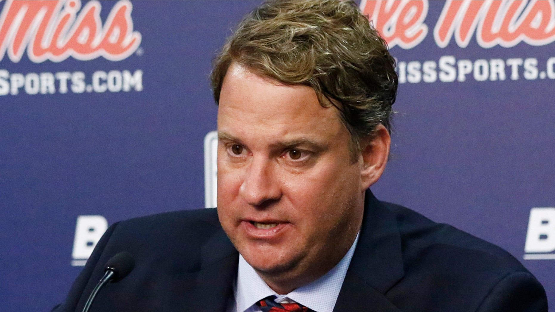 Lane Kiffin responds to reporters questions at a news conference, after being introduced to Mississippi fans as their new NCAA college football coach, at The Pavilion, a multipurpose arena on the campus in Oxford, Miss., Monday, Dec. 9, 2019. Kiffin was previously, the football coach for three years at Florida Atlantic. (AP Photo/Rogelio V. Solis)