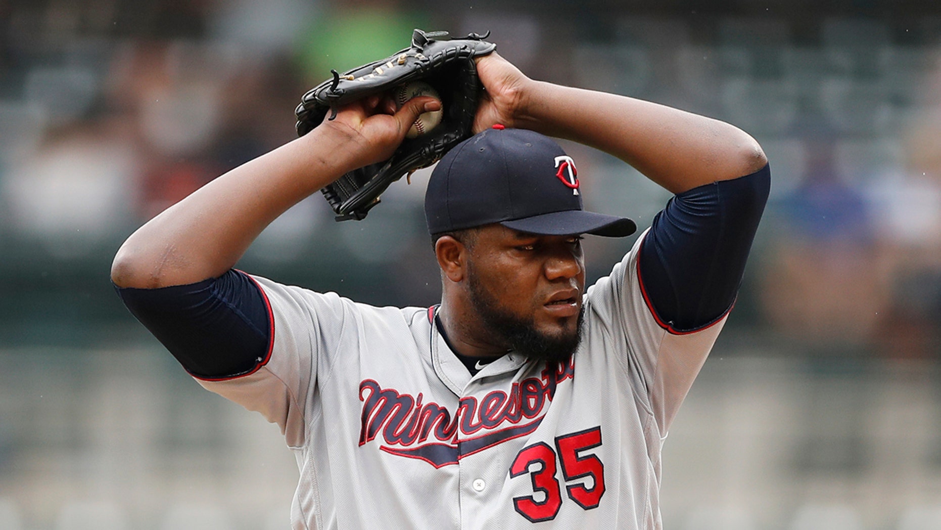 FILE - in this Sept. 1, 2019, file photo, Minnesota Twins starting pitcher Michael Pineda prepares to throw during the first inning of the team's baseball game against the Detroit Tigers in Detroit. The Twins and Pineda agreed Thursday, Dec. 5, 2019, to a two-year, $20 million contract to bring the right-hander back after a suspension for a banned diuretic, according to a person familiar with the negotiations. (AP Photo/Carlos Osorio, File)