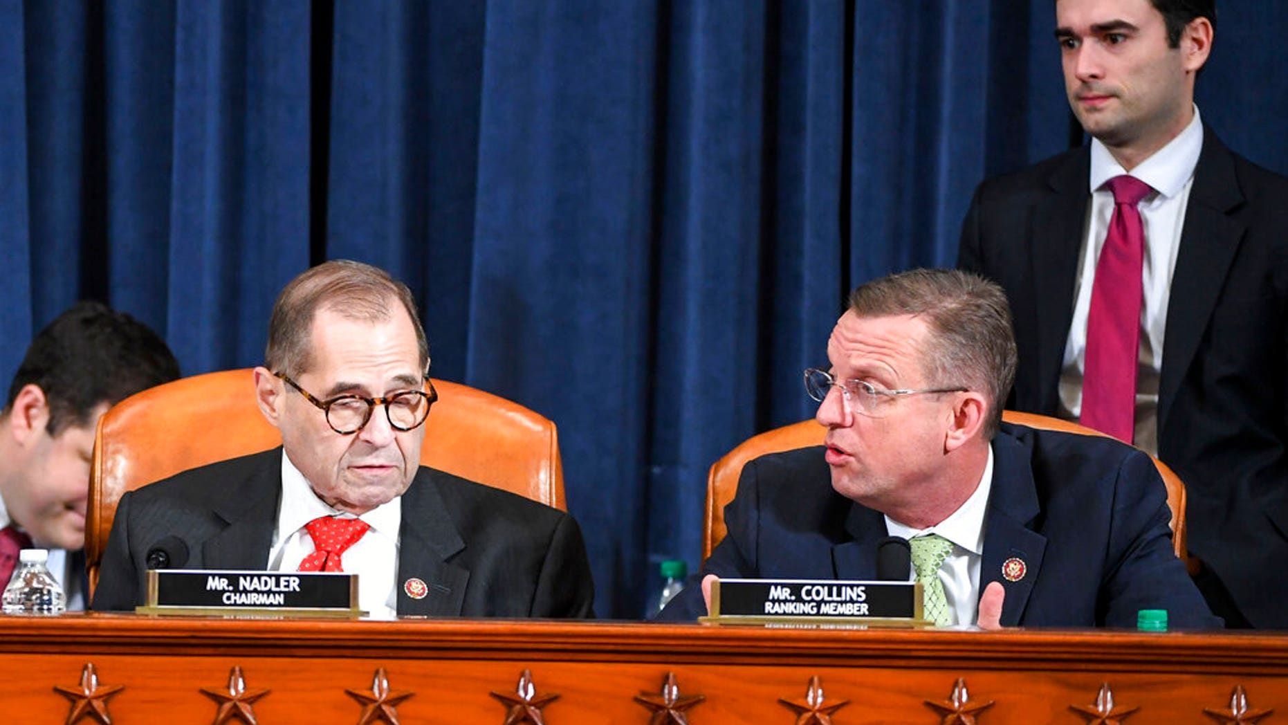 House Judiciary Committee ranking member Rep. Doug Collins, R-Ga., right, voices his displeasure after House Judiciary Committee Chairman Rep. Jerrold Nadler, D-N.Y., announced a recess at a House Judiciary Committee markup of the articles of impeachment against President Trump. (Jonathan Newton/The Washington Post via AP, Pool)