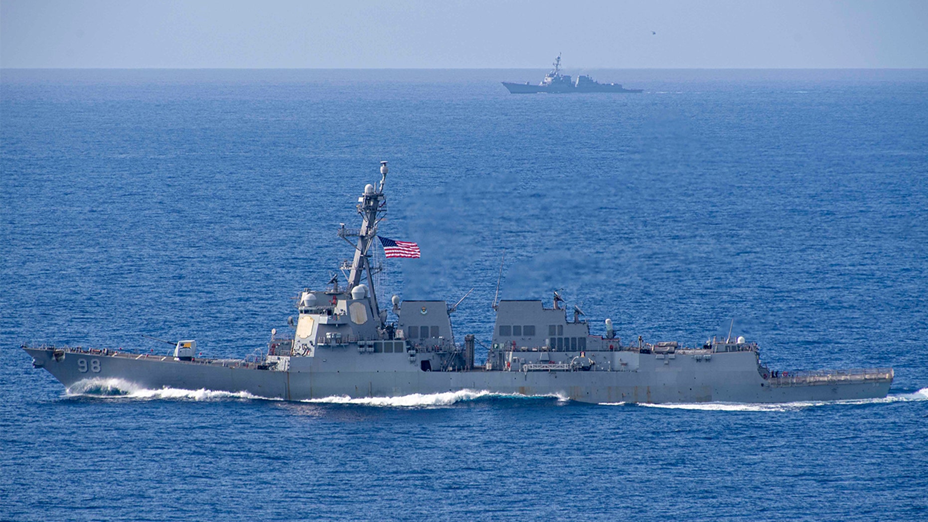 The Arleigh Burke-class guided-missile destroyers USS Forrest Sherman (DDG 98) and USS Farragut (DDG 99) transit the Atlantic Ocean - file photo.