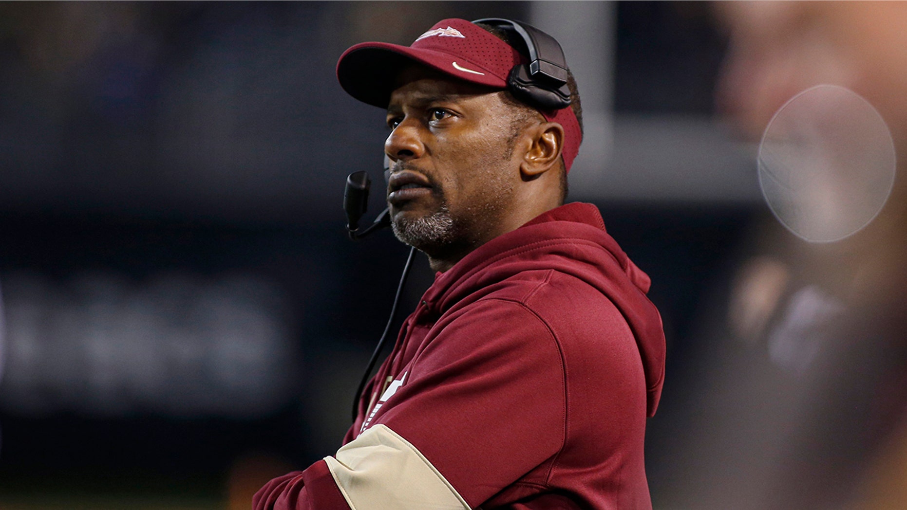 FILE - In this Saturday, Oct. 19, 2019, file photo, Florida State coach Willie Taggart watches his team play Wake Forest during the first half of an NCAA college football game in Winston-Salem, N.C. Florida Atlantic has reached an agreement with Taggart to be its new football coach, replacing Lane Kiffin, said a person familiar with the negotiations. (AP Photo/Nell Redmond, File)