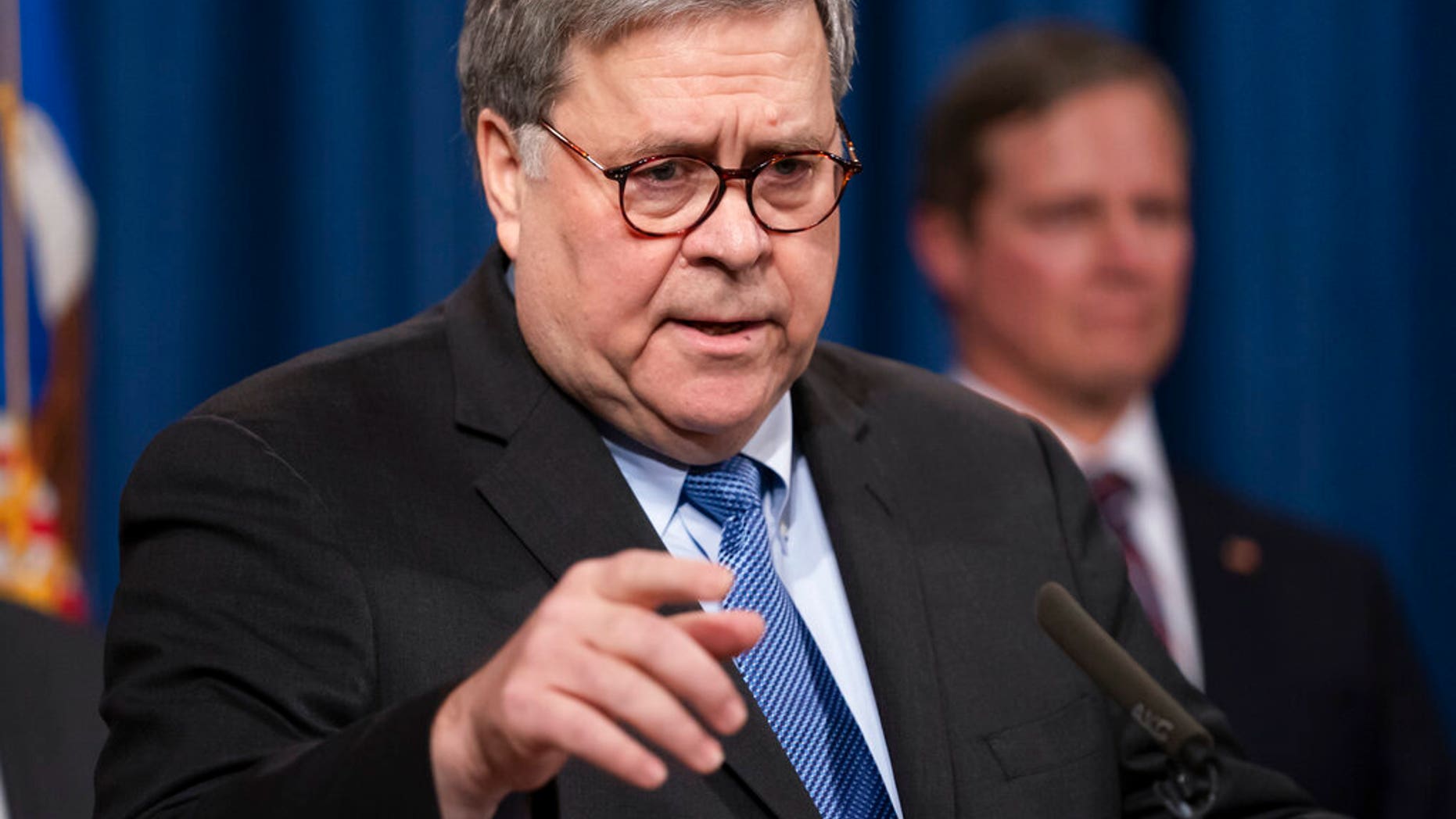 Attorney General William Barr speaks to reporters at the Justice Department in Washington, Monday, Jan. 13, 2020. (AP Photo/J. Scott Applewhite)