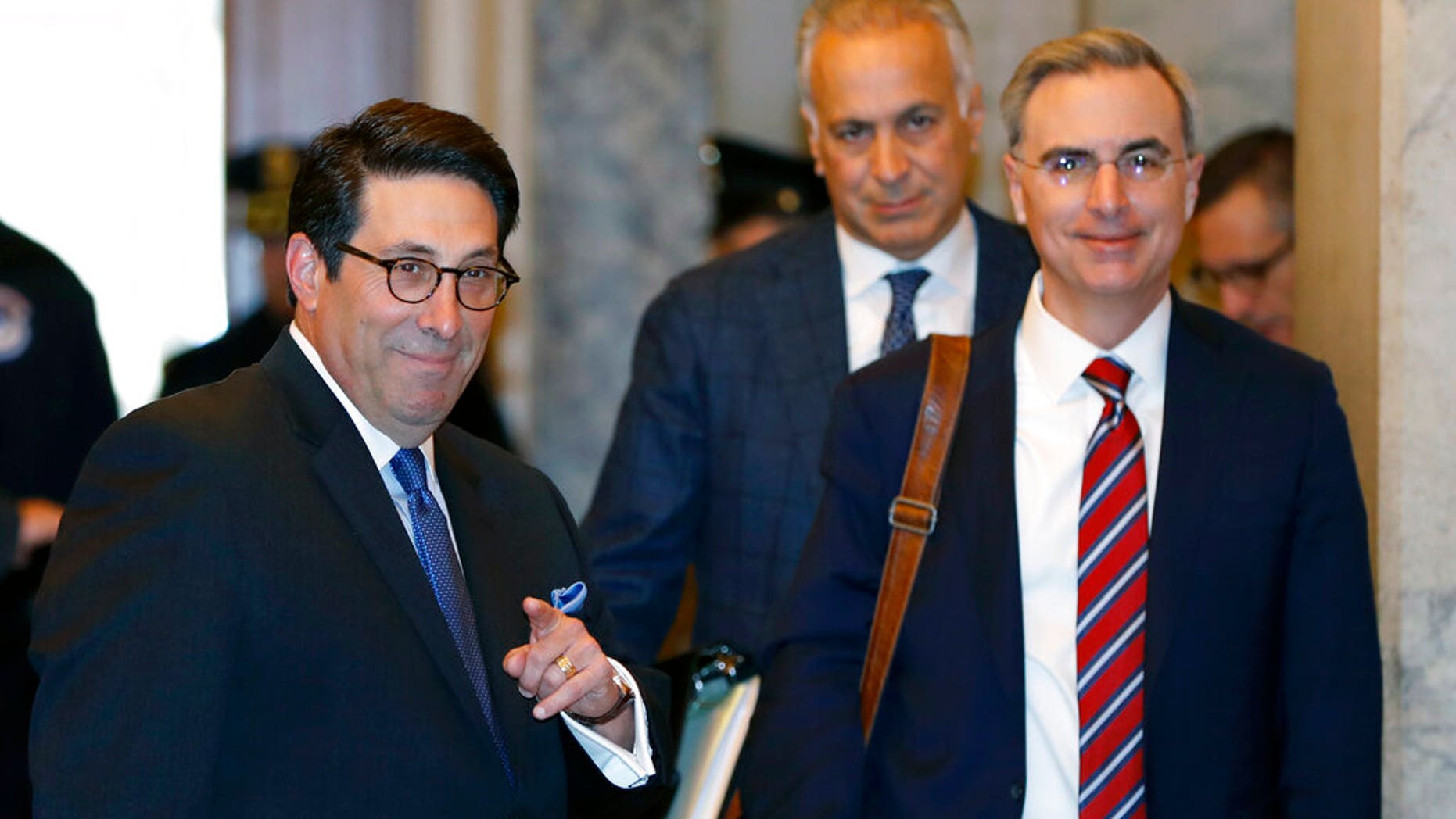 President Trump's personal attorney Jay Sekulow, left, gestures while standing with White House Counsel Pat Cipollone, right, while arriving at the Capitol in Washington. (AP Photo/Julio Cortez)