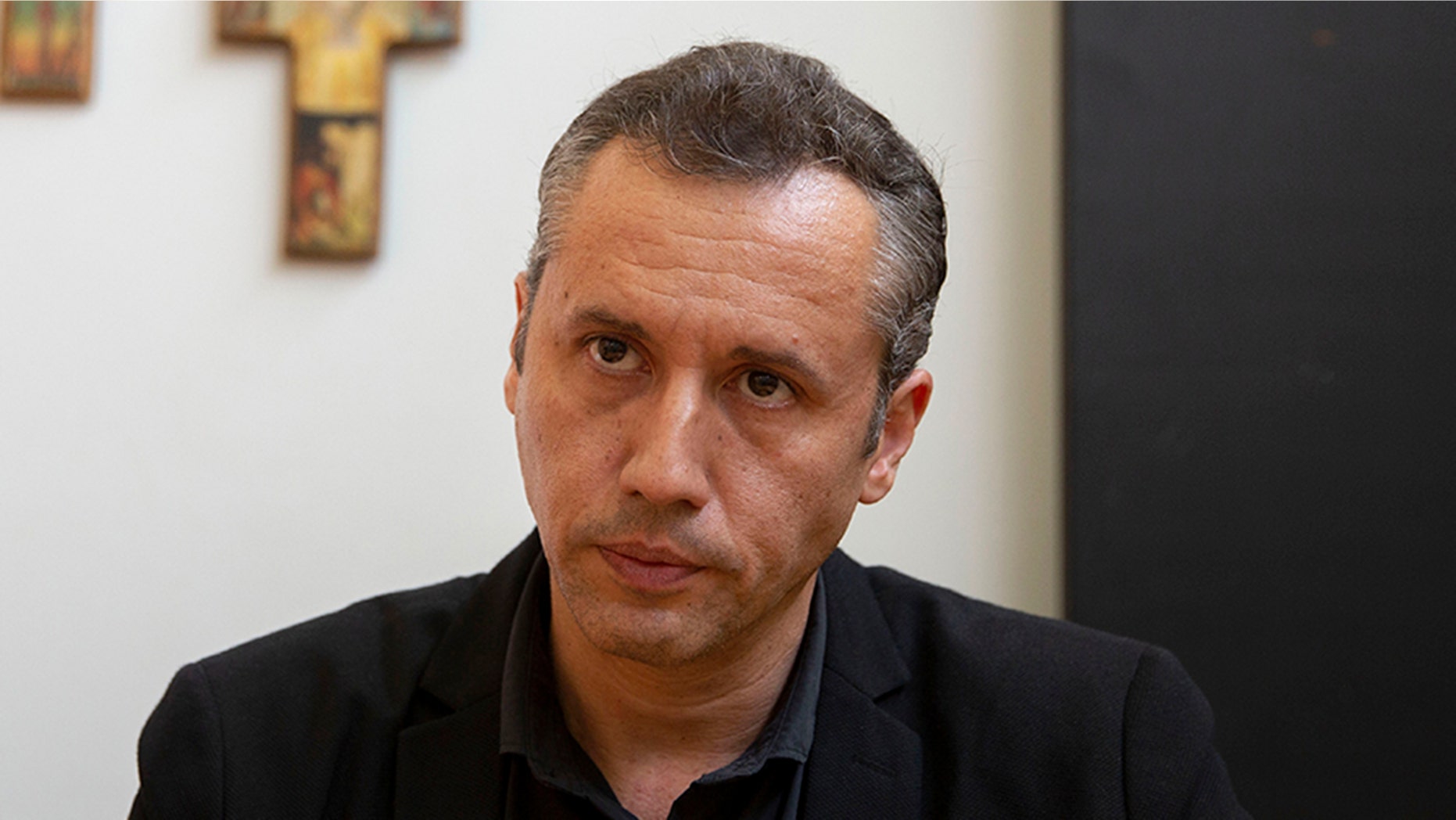 Oct. 25, 2019 --Roberto Alvim, director of theater, dance and opera at the Brazil's National Arts Foundation, poses for pictures in Brasilia, Brazil. (AP Photo/Eraldo Peres, File)