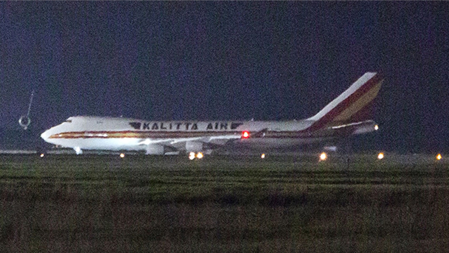 A plane carrying American passengers released from the Diamond Princess cruise ship in Japan arrives early Monday at Travis Air Force Base in California (Getty Images)