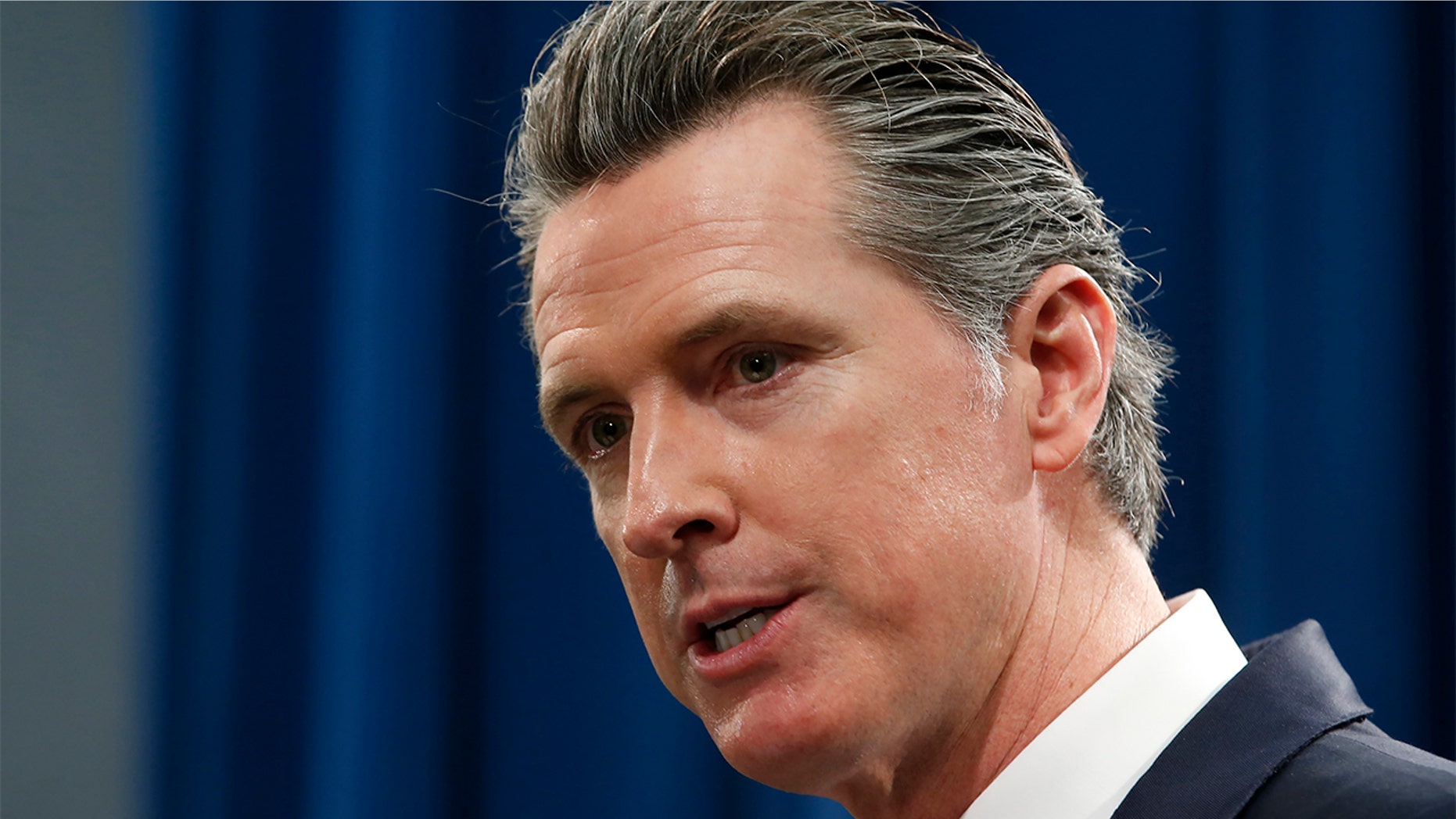 FILE - In this Jan. 10, 2020 file photo California Gov. Gavin Newsom responds to a reporters question during a news conference in Sacramento, Calif. Newsom announced Wednesday, Feb. 5, 2020. (AP Photo/Rich Pedroncelli, File)