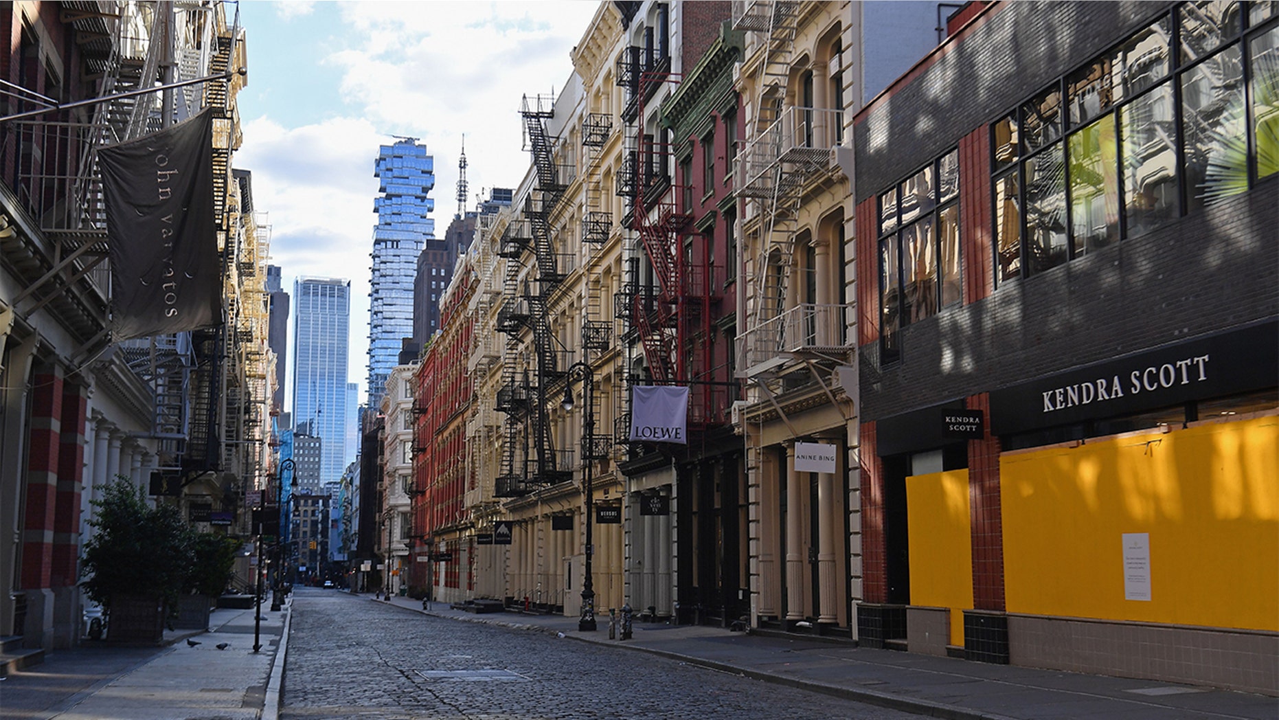Boarded up storefronts are seen in the SoHo neighborhood of New York City on April 1, 2020. (Photo by Angela Weiss / AFP) (Photo by ANGELA WEISS/AFP via Getty Images)