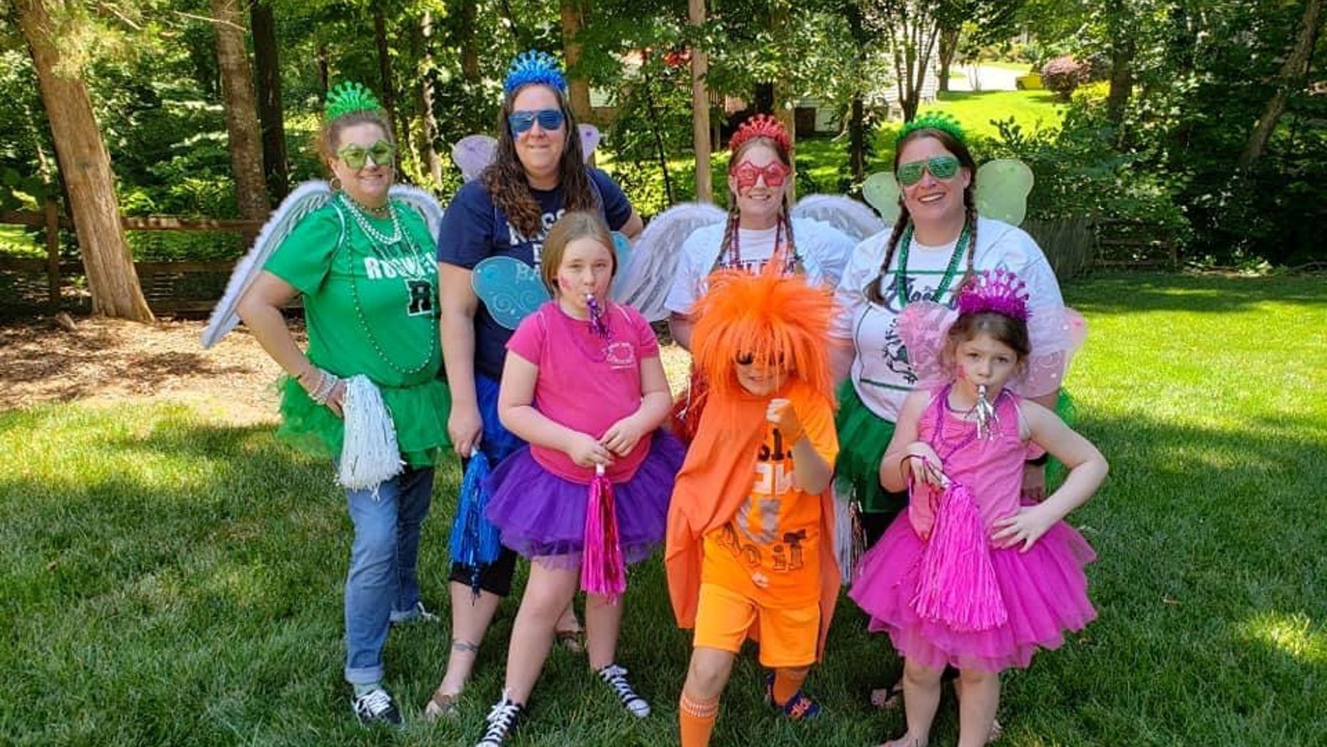 Members of the North Carolina Sisterhood of the Traveling Wine, which is now in 10 states since it started in April.