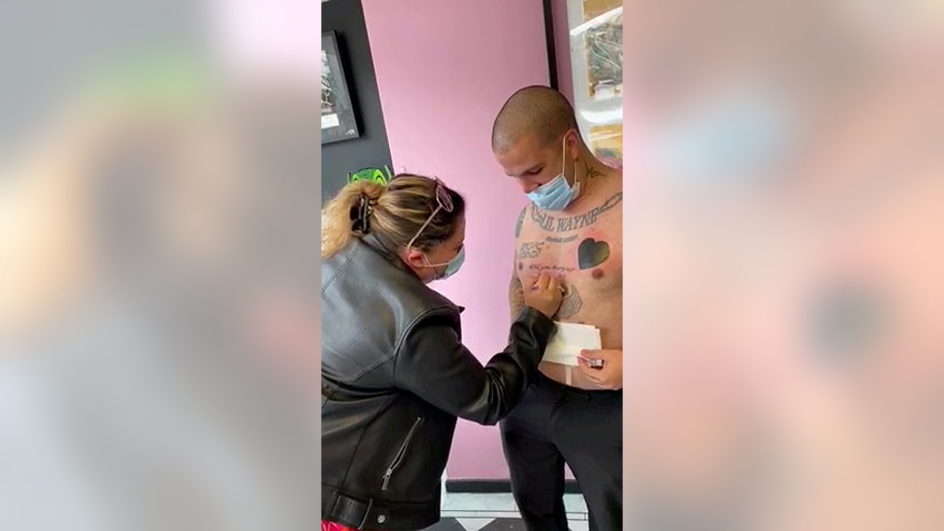 Bruno Neves. from Great Yarmouth, U.K., popped the question to his girlfriend Patricia Calado with a tattoo that read "Will you marry me?" (SWNS)