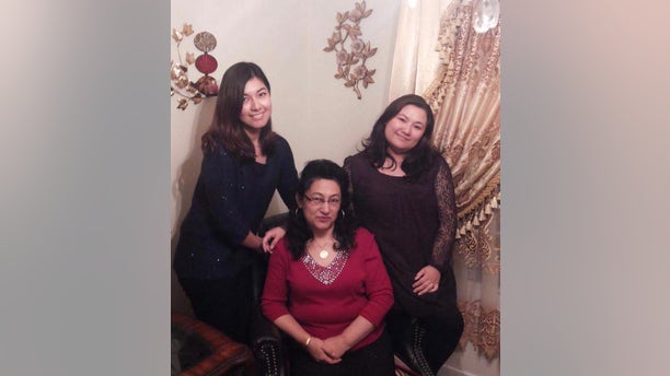 Happier times: Murat (right) and her sister Zamira (left) with their mother Dr. Gulshan Abbas, before she "disappeared" in the Muslim-majority Xinjiang region of China in 2018.