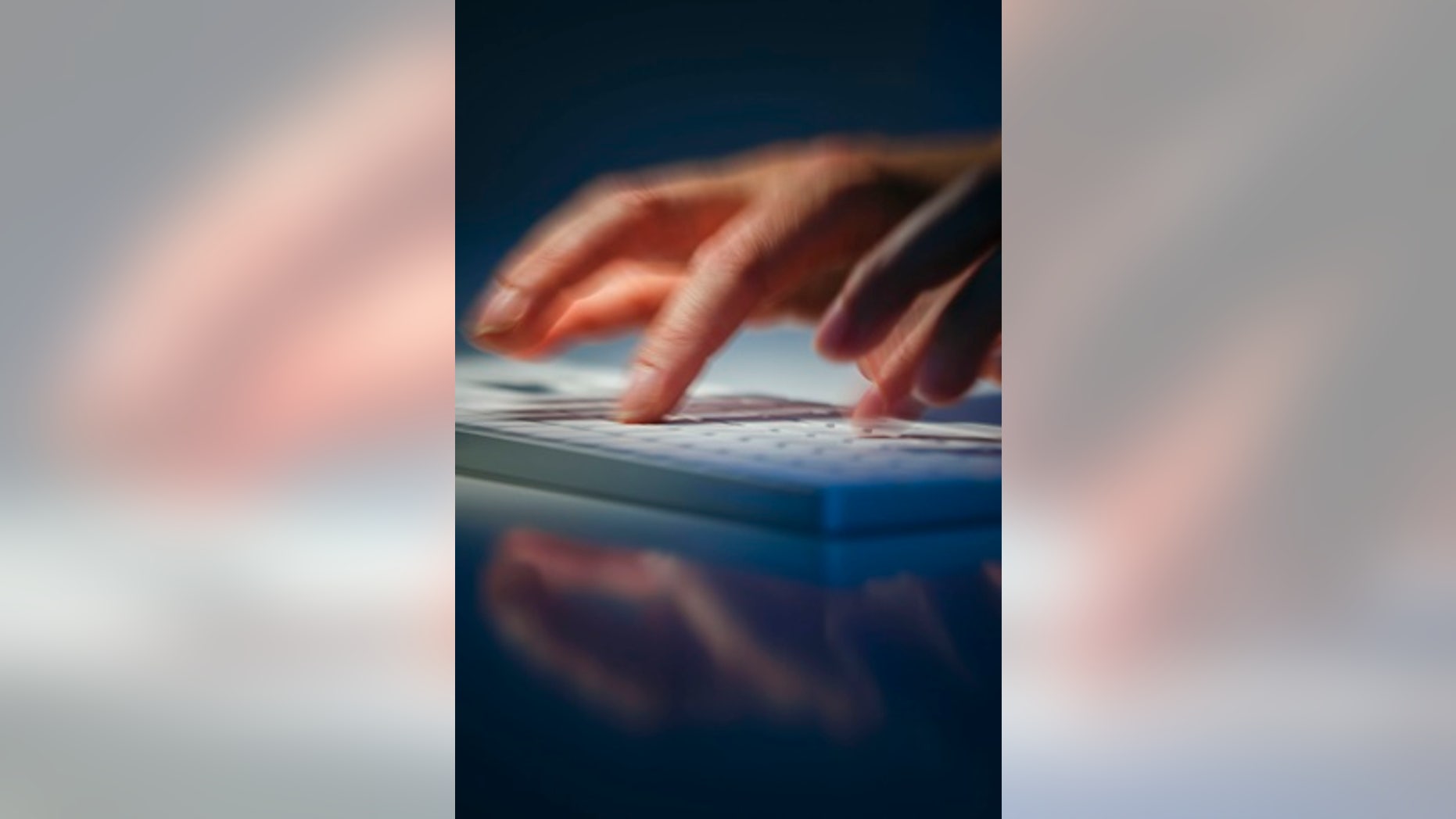 Berlin, Germany - August 28: Symbolic photo on the subject of hackers and data security. Hands write on a computer keyboard on August 28, 2019 in Berlin, Germany.