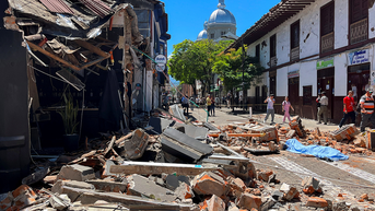 Collapsed building and debris on street - Fox News