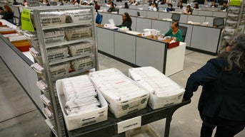 Judge blocks USPS from enforcing Trump mail-in ballot order ahead of midterms - Fox News
