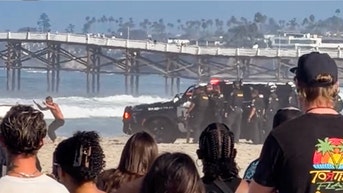 Wild police chase spills onto California beach as stunned sunbathers watch arrest - Fox News