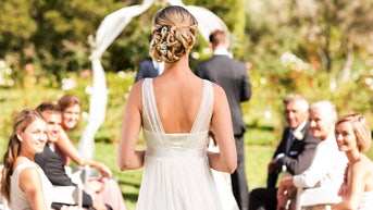 Reality star accused of upstaging bride with ‘too close to white’ gown at son’s wedding - Fox News