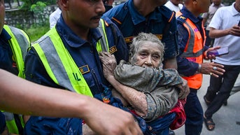 RESCUERS SAVING WOMAN - Fox News