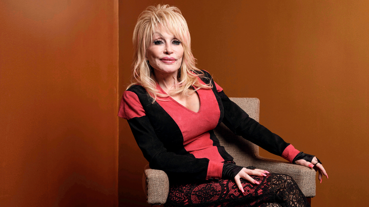 dolly pink and black shirt sitting - Fox News