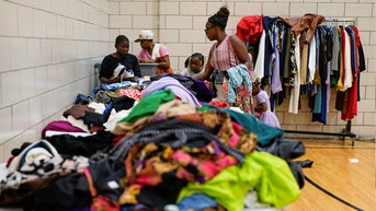 PILE OF CLOTHES AT SHELTER - Fox News