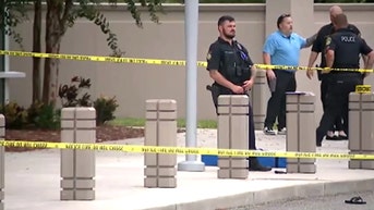 Officers leap into action after 70-year-old woman allegedly opens fire inside police dept - Fox News