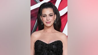 Anne Hathaway TAKES charge on carpet - Fox News
