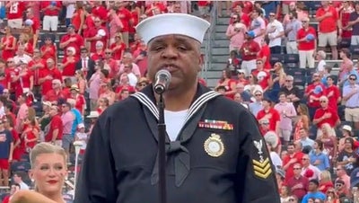 Retired Navy officer goes viral for powerful National Anthem performance - Fox News
