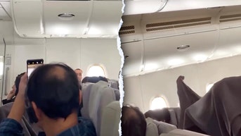 Water pours from plane ceiling, drenching passengers mid-flight in viral video - Fox News