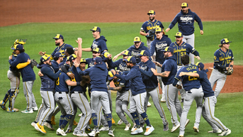 team celebrating in field - Fox News