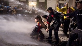 Protesters sprayed with water - Fox News