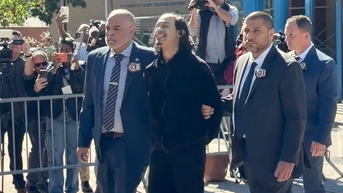 Man accused of throwing woman and infant off 15th floor smiles as bystanders erupt - Fox News