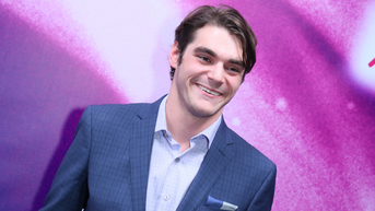smiling pink background - Fox News