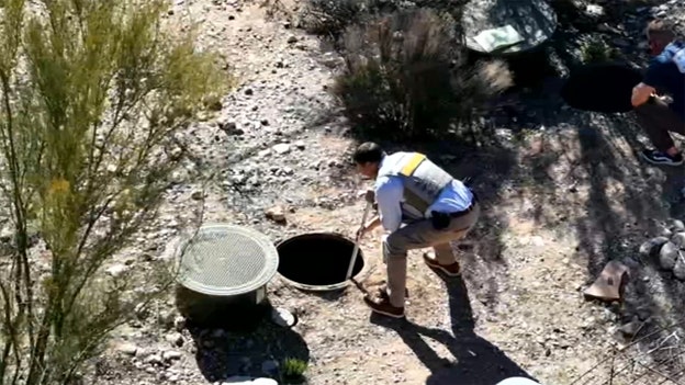 Aerial footage shows authorities searching manhole behind Nancy Guthrie's house