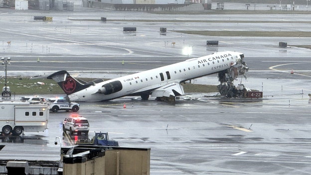 Flight attendant who was strapped into seat was ejected: report