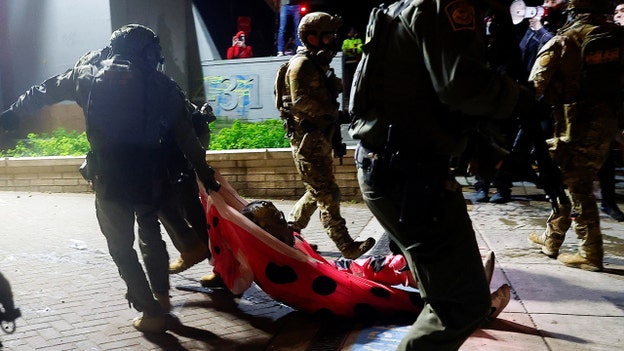 Portland police make arrests after protests escalate outside ICE facility