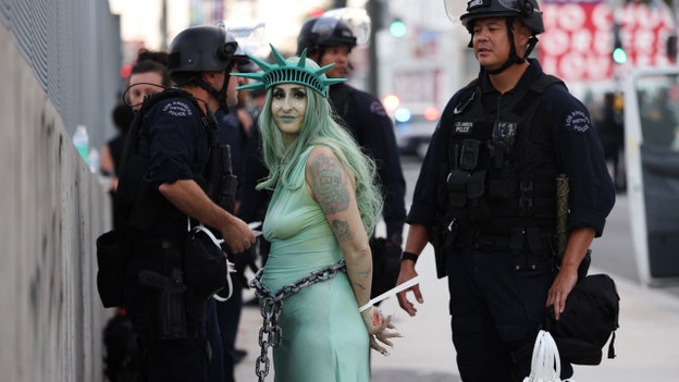 Protester dressed as Statue of Liberty arrested in LA after ‘No Kings’ rally
