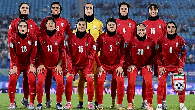Iran women’s soccer team signals distress after anthem protest