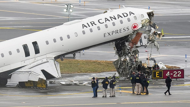 Miracle survival after LaGuardia crash as attendant thrown from aircraft