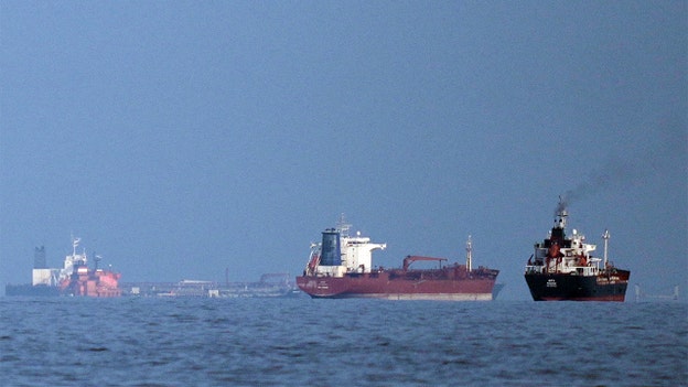 Iran reimposes restrictions on Strait of Hormuz, warns it will continue to block transit