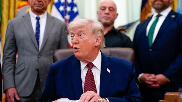 Trump says Iran 'can't blackmail us' on Strait of Hormuz, says negotiations 'working out very well'