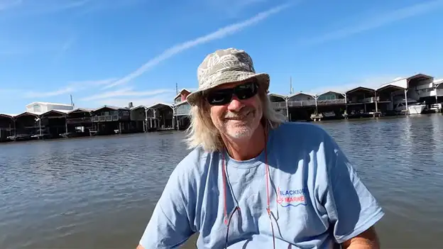 Brian Hooker sent messages to friend after wife vanished from dinghy: 'The wind blew me away'